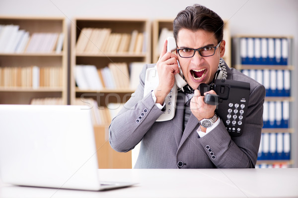 Angry helpdesk operator yelling in office Stock photo © Elnur