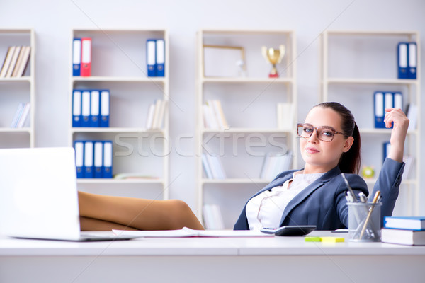 Stock photo: Businesswoman working in the office at desk