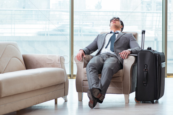 Young businessman in airport business lounge waiting for flight Stock photo © Elnur