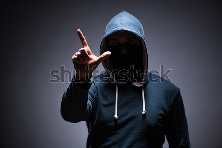 Criminal with gun isolated on white Stock photo © Elnur
