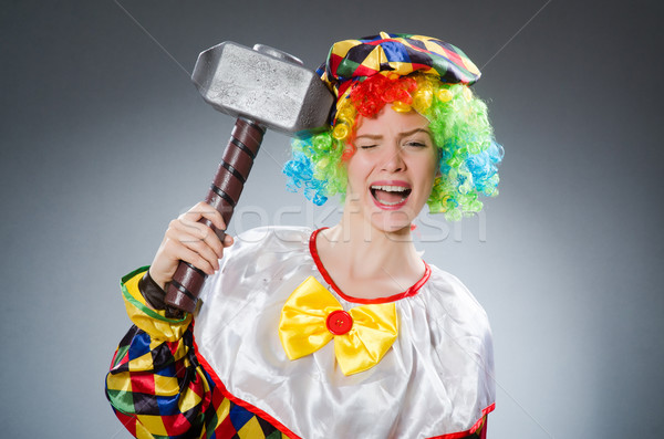 Clown with hammer in funny concept Stock photo © Elnur