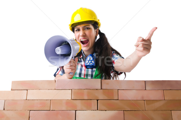 Mulher alto-falante isolado branco construção parede Foto stock © Elnur