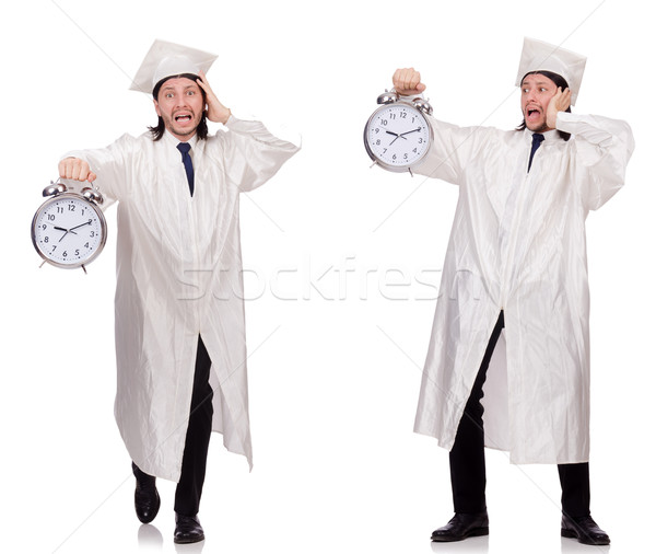 Stock photo: The young man student with clock isolated on white