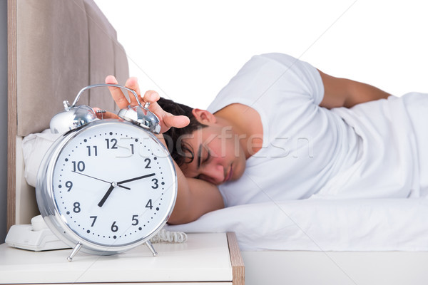 Foto d'archivio: Uomo · letto · sofferenza · insonnia · clock · sonno