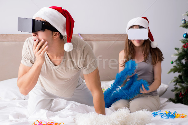 Happy couple celebrating christmas holiday in bed Stock photo © Elnur