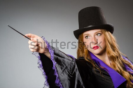 Young woman gangster with gun on white Stock photo © Elnur