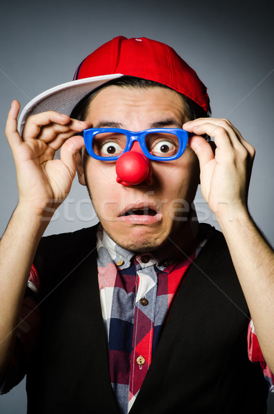 Funny clown against the dark background Stock photo © Elnur