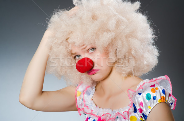 Clown with white wig against grey background Stock photo © Elnur