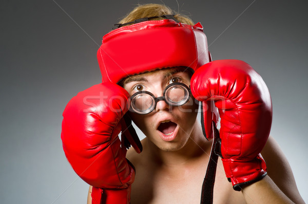Stock photo: Funny nerd boxer in sport concept