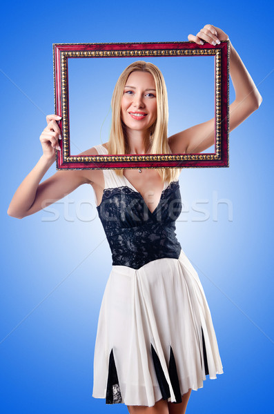 Jeune femme cadre photo blanche visage bois modèle [[stock_photo]] © Elnur