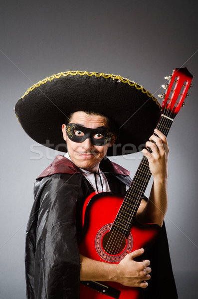 [[stock_photo]]: Personne · sombrero · chapeau · drôle · guitare