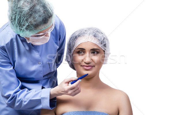 Young woman preparing for plastic surgery isolated on white Stock photo © Elnur