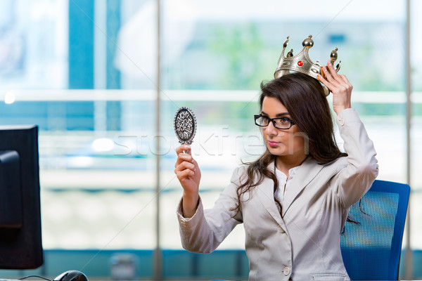 Businesswoman sitting at the office desk Stock photo © Elnur