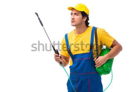 Man in green coveralls with axe isolated on white Stock photo © Elnur