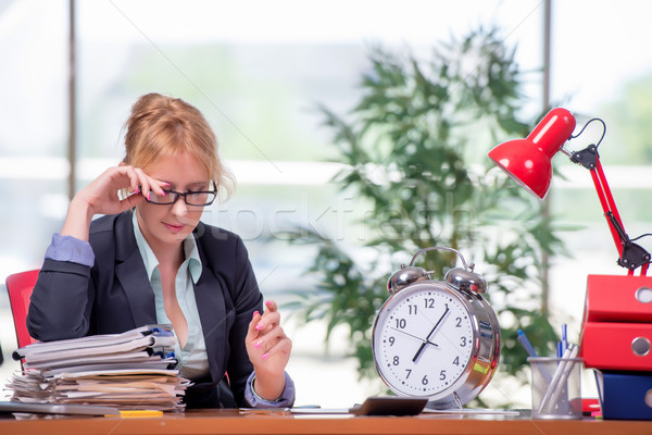 Businesswoman working in the office Stock photo © Elnur