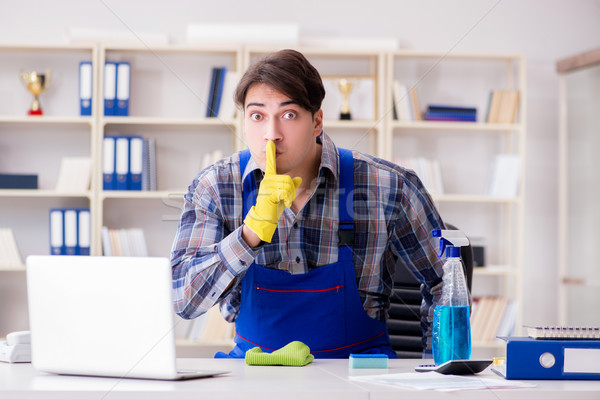 The male cleaner working in the office Stock photo © Elnur