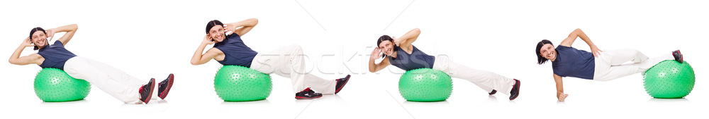 Man with swiss ball isolated on white Stock photo © Elnur