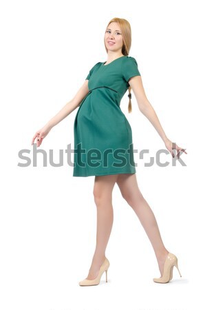 Beautiful pregnant woman in green dress isolated on white Stock photo © Elnur