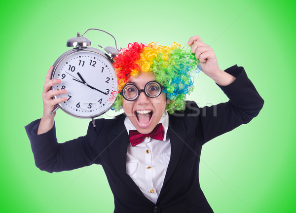 Funny clown with clock on white Stock photo © Elnur