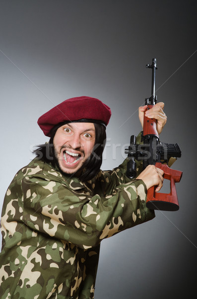 Soldat Handfeuerwaffe grau Haar Hintergrund funny Stock foto © Elnur