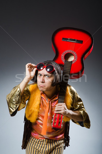 Mann Gitarre musikalische Party Bühne funny Stock foto © Elnur