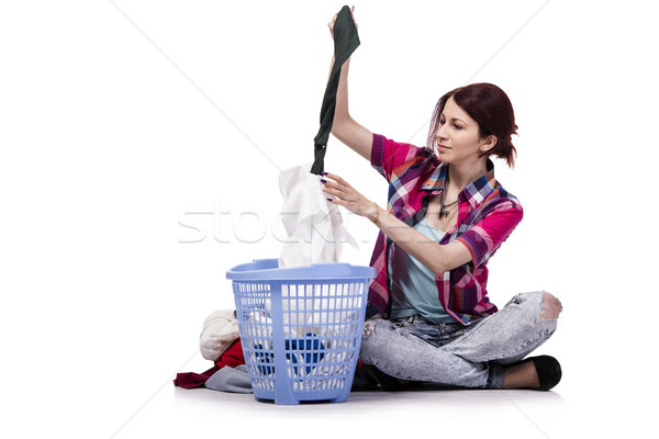 Woman tired after doing laundry isolated on white Stock photo © Elnur