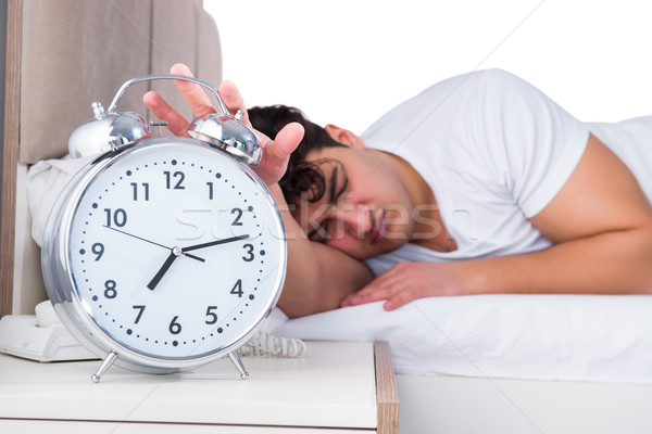 男子 床 失眠 時鐘 睡覺 商業照片 © Elnur