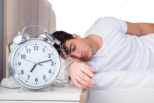 Homme lit souffrance insomnie horloge dormir [[stock_photo]] © Elnur