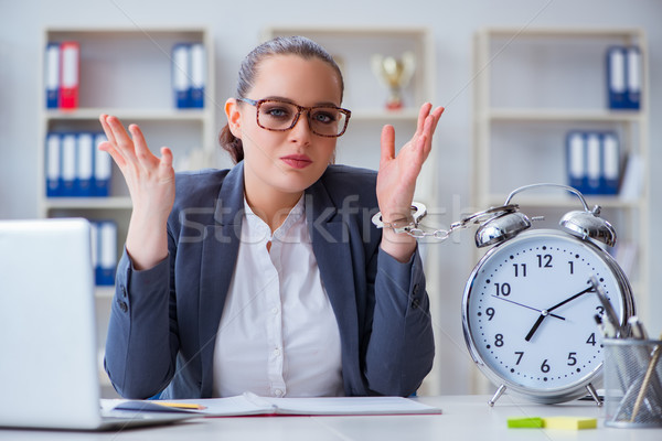 Businesswoman in time management concept  Stock photo © Elnur