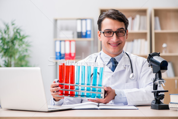 Man doctor working in the lab Stock photo © Elnur