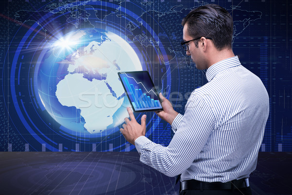 ビジネスマン 未来的な コンピューティング 世界 地球 ネットワーク ストックフォト © Elnur