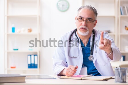 Doctor lecturer explaining the heart model Stock photo © Elnur