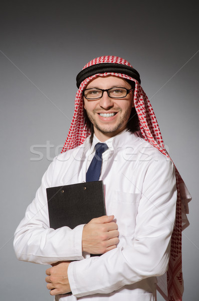 Arab man with paper binder Stock photo © Elnur