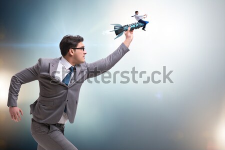 Businessman with gun isolated on white Stock photo © Elnur