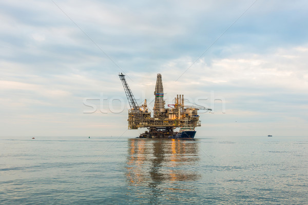 Oil rig platform in the calm sea Stock photo © Elnur