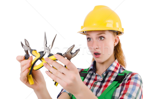 Construction worker female with pliers isolated on white Stock photo © Elnur