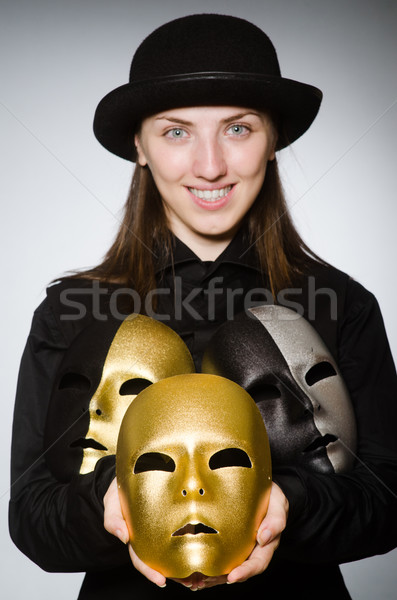 Stock photo: Woman with mask in funny concept