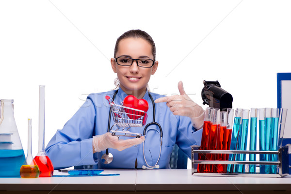 Jeunes médecin rouge coeur laboratoire femme [[stock_photo]] © Elnur