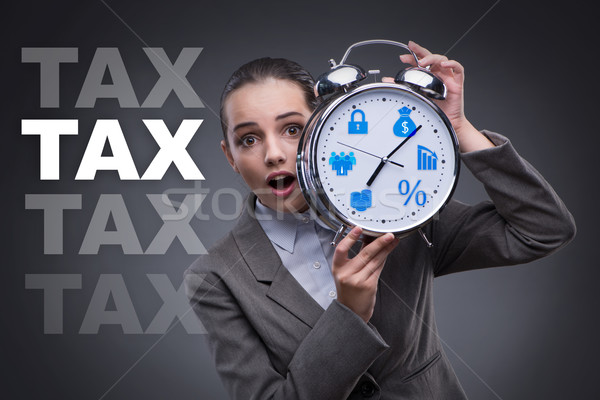 Businessman in late taxes payment concept Stock photo © Elnur