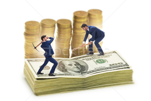 Cryptocurrency concept with businessman mining money Stock photo © Elnur