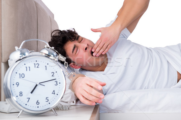 Man bed lijden slapeloosheid klok slapen Stockfoto © Elnur