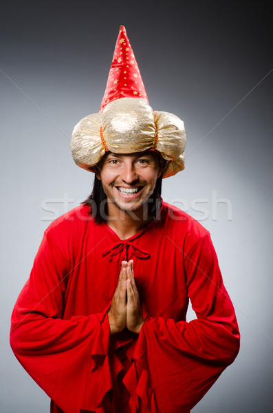 Funny wizard wearing red dress Stock photo © Elnur