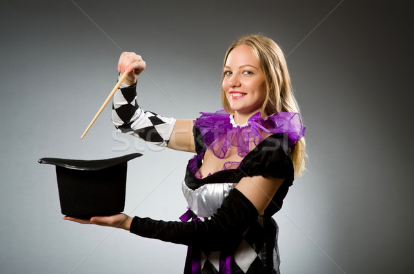 Vrouw goochelaar hand glimlach pak portret Stockfoto © Elnur