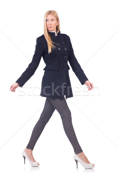 Woman in dark coat isolated on white Stock photo © Elnur