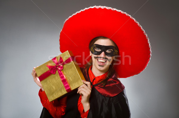 Person wearing sombrero hat in funny concept Stock photo © Elnur