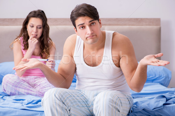 Stock photo: Man husband upset about pregnancy test results