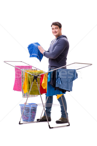 Husband man doing laundry isolated on white Stock photo © Elnur
