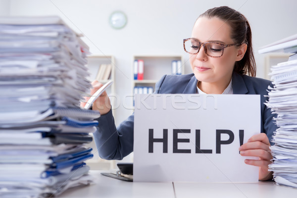 Businesswoman pleading for help in office Stock photo © Elnur