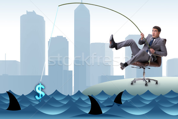 Businessman fishing out dollars from water Stock photo © Elnur