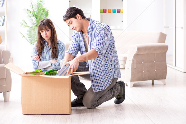 Young family moving in to new apartment after paying off mortgag Stock photo © Elnur